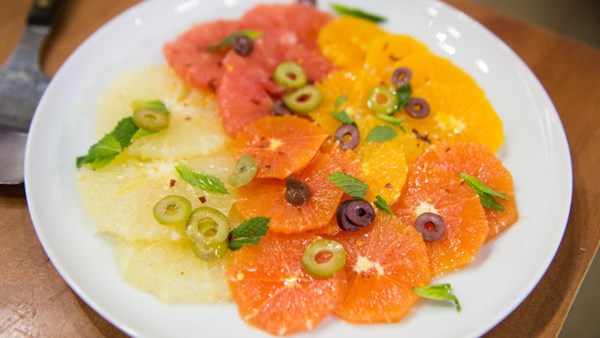 Sliced oranges with olives and red chiles