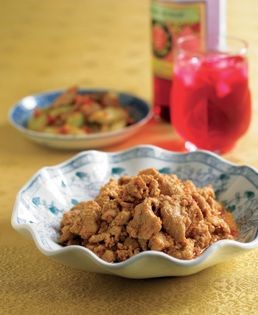 Sliced pork stir-fried in spicy coconut gravy (Satay babi)