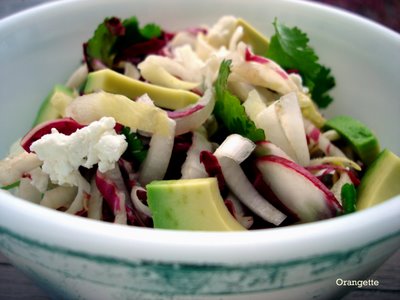 Sliced spring salad with endive, cilantro, radishes, and feta