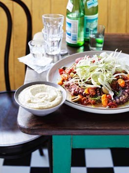 Slow-braised octopus with fennel purée and tomato and olive salad