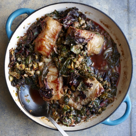 Slow-braised pork belly with wilted greens, olives and capers
