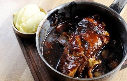 Slow-braised shoulder of lamb with onions, thyme and balsamic