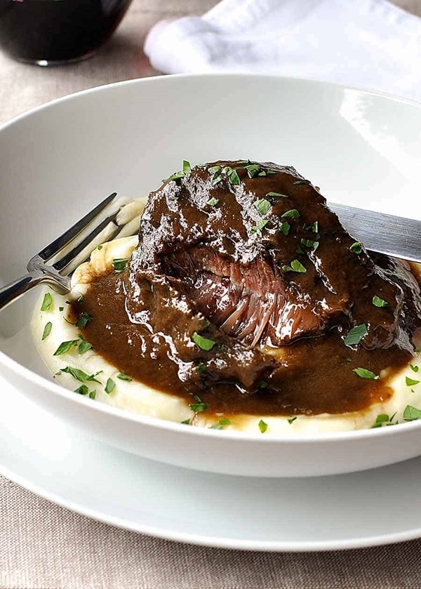 Slow cooked beef cheeks in red wine sauce