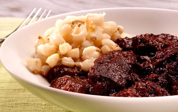 Slow-cooked carne adovada with hominy