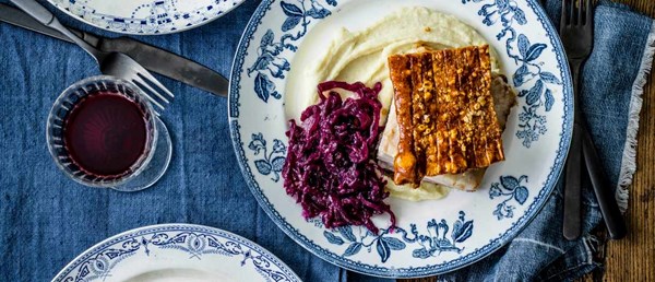 Slow-cooked crackling pork with sweet and sour cabbage and creamy mustard mash