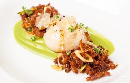 Slow-cooked duck egg with Peking-style leg meat, spring onion purée, cucumber, pancake crumb