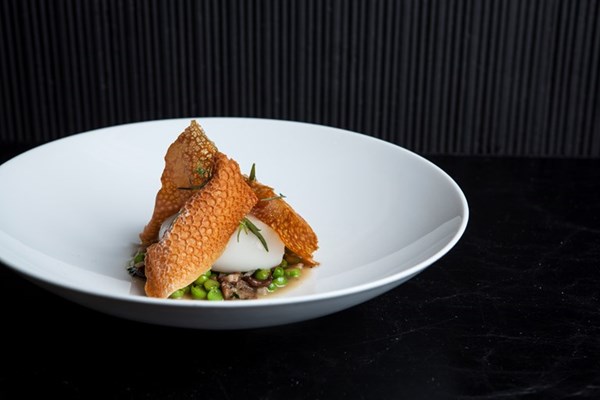 Slow-cooked duck egg with peas, mousserons, Chardonnay vinegar and smoked bacon