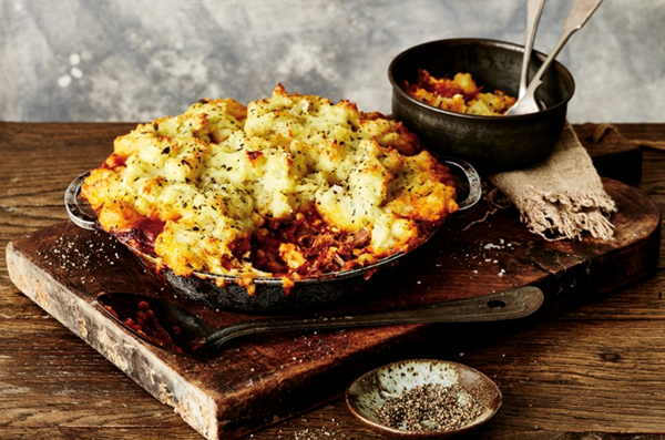 Slow-cooked lamb and feta pie with garlic and herb mash