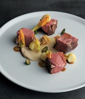 Slow-cooked lamb rump with kipfler potato and hazelnut