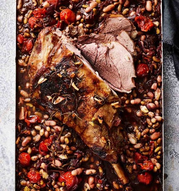 Slow-cooked leg of lamb with beans and tomatoes