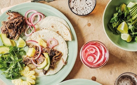 Slow-cooked Mexican-spiced lamb shoulder with quick-pickled red onions and pineapple