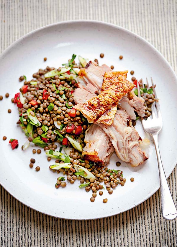Slow-cooked pork belly with warm lentil salad