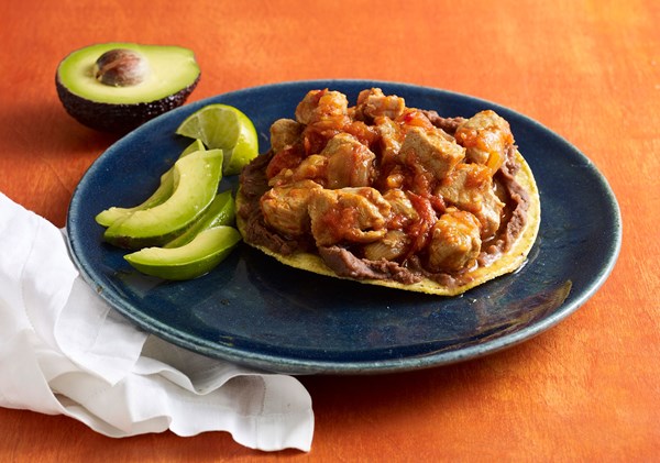 Slow-cooked pork loin with caramelized tomatoes (Lomitos de Valladolid)