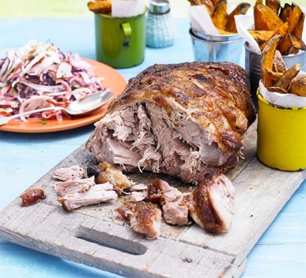 Slow-cooked pork with spicy coleslaw and sweet potato wedges