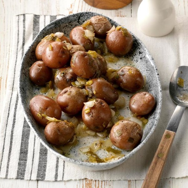 Slow-cooked potatoes with spring onions