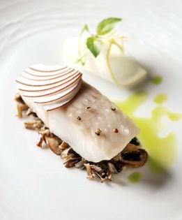Slow-cooked sablefish with green onion, green apple, coconut, and basil-mint oil