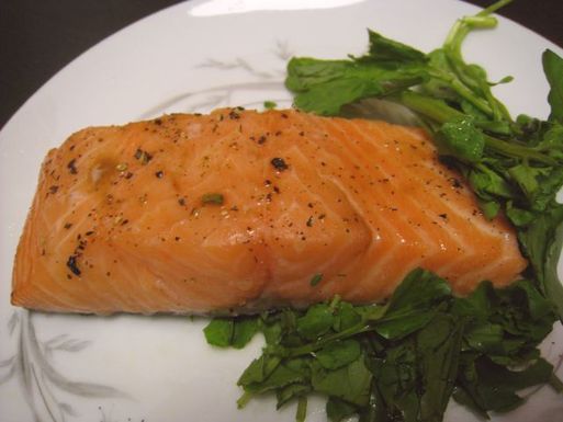 Slow cooked salmon fillets with savory-sweet pea shoot soy sauce