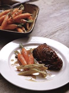 Slow-cooked shin of veal with roast bone marrow, braised celery and carrots