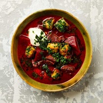 Slow-cooked shin soup with beetroot and pomegranate