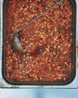 Slow-cooked tomato and herb white beans