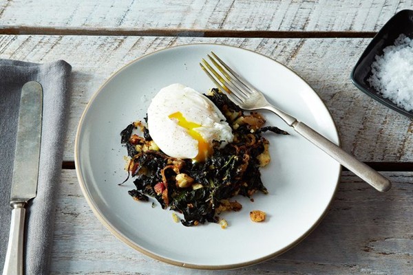 Slow-cooked Tuscan kale with pancetta, breadcrumbs, and a poached egg