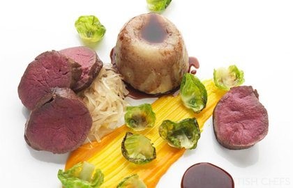Slow-cooked venison suet pudding with choucroute and carrot purée