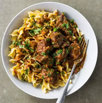 Slow-cooker beer-braised beef with onions