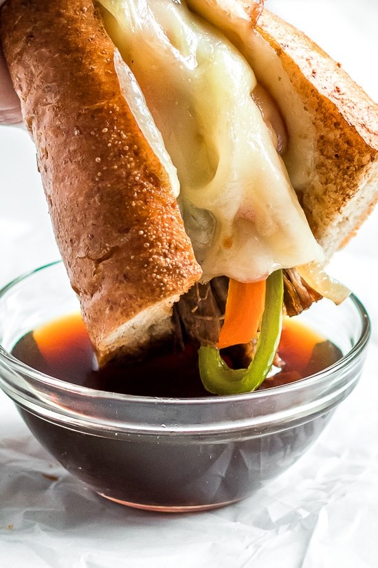 Slow cooker French dip sandwiches with caramelized onions
