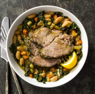 Slow-cooker herbed pork with white beans and kale