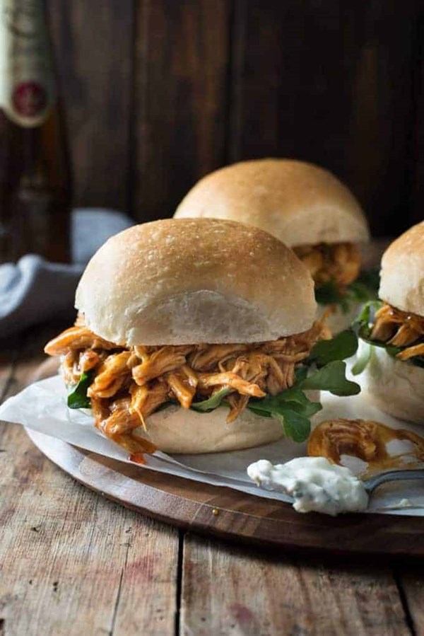 Slow cooker honey Buffalo chicken sliders [blue cheese sauce]