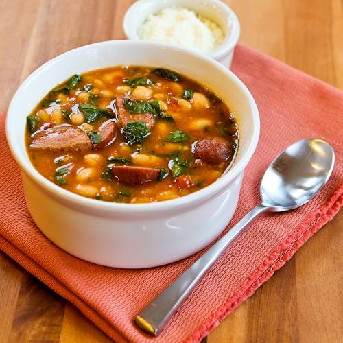 Slow cooker kielbasa and white bean stew with tomatoes and spinach
