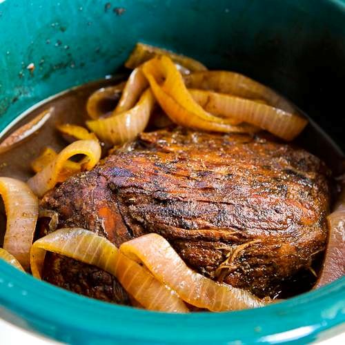 Slow cooker pork sirloin tip roast with balsamic vinegar, rosemary, and red onions