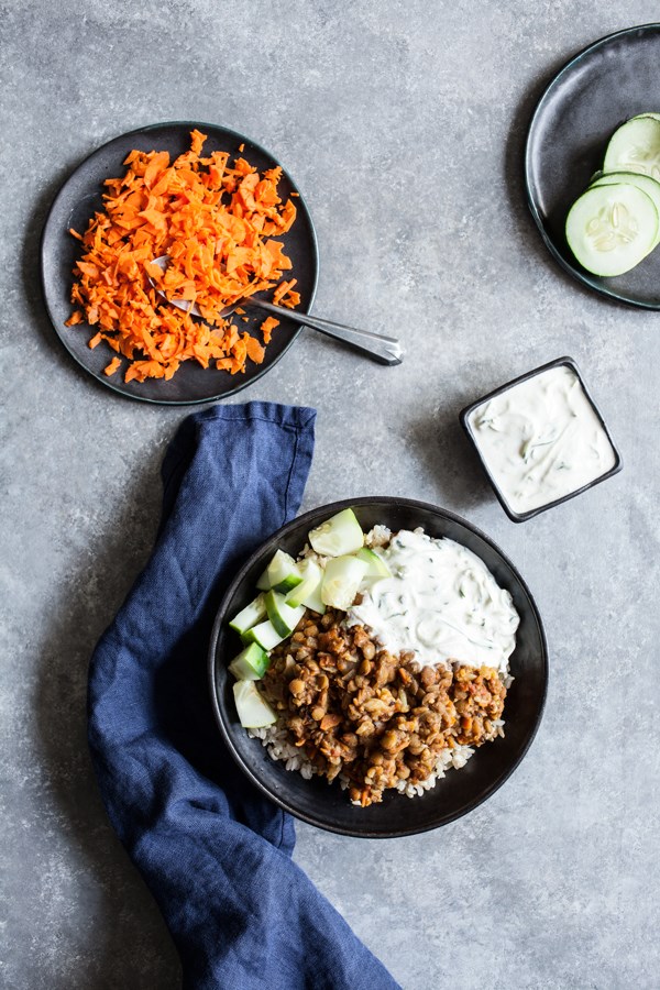 Slow-cooker spiced lentils and cauliflower over carrot rice