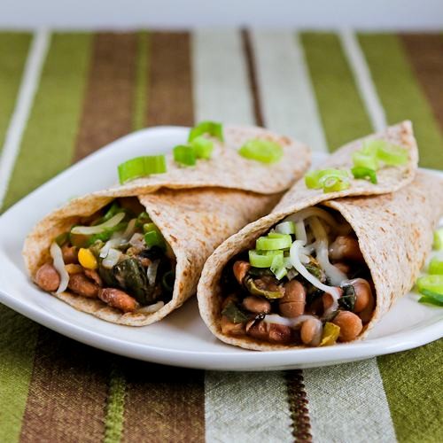 Slow cooker spicy vegetarian pinto bean and chard burritos