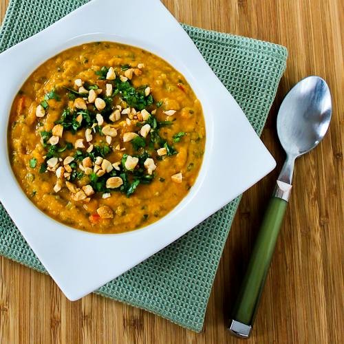 Slow cooker Thai-inspired butternut squash and peanut soup with red bell pepper, lime, and cilantro