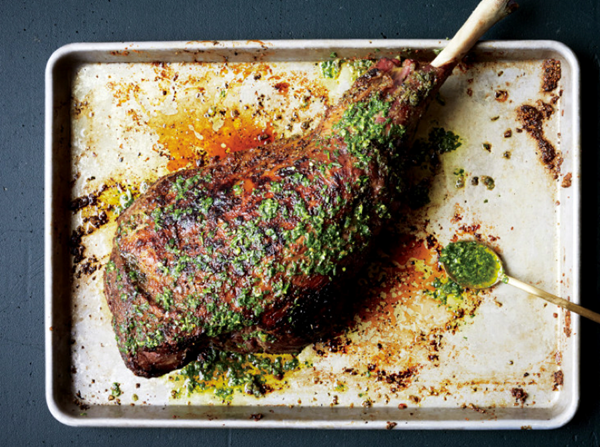 Slow-grilled leg of lamb with mint yogurt and salsa verde