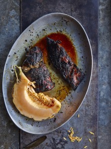 Slow-grilled pork belly with cacao beans and melon de milpa