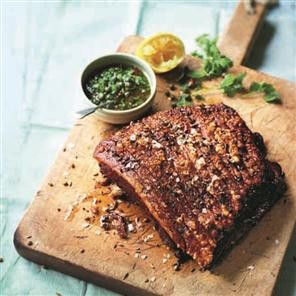 Slow-roast fennel and coriander pork belly with chilli spiked salsa verde