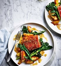 Slow-roast pork with rosemary potatoes and sprouting broccoli