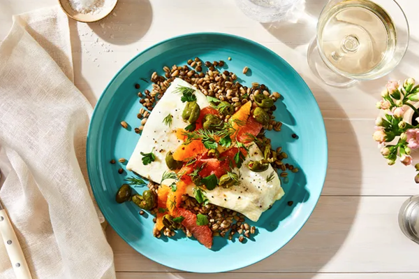 Slow-roasted Alaska halibut with citrus & smashed olives