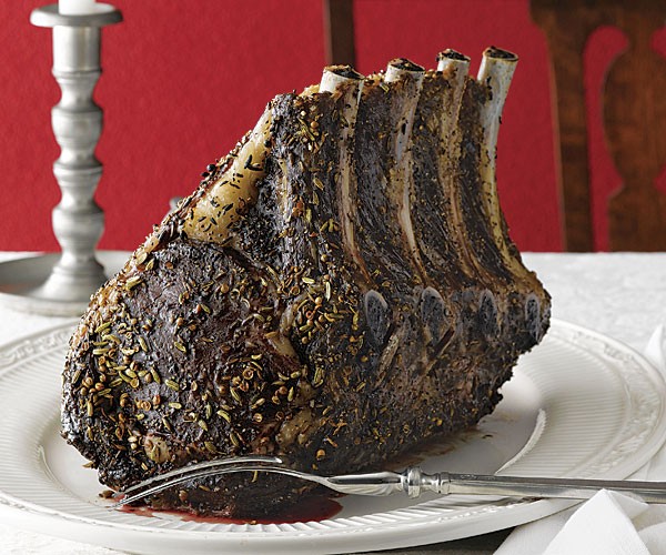 Slow-roasted beef standing rib roast with brown ale butter sauce