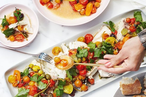 Slow-roasted blue-eye with tomatoes and olives