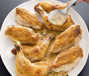 Slow-roasted chicken parts with shallot-garlic pan sauce