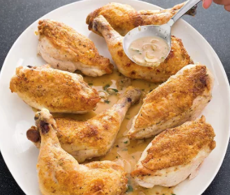 Slow-roasted chicken parts with shallot-garlic pan sauce