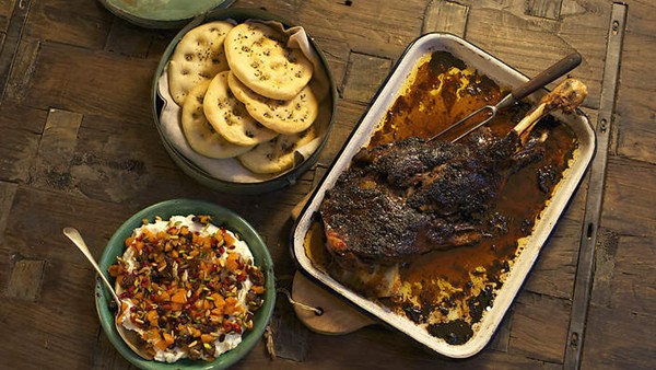 Slow-roasted lamb shoulder with nomad's jewelled yoghurt and nigella seed bread
