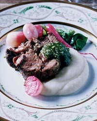 Slow-roasted lamb shoulder with almond-mint pesto