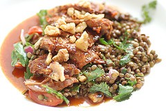Slow roasted lamb with red capsicum paste & pomegranate