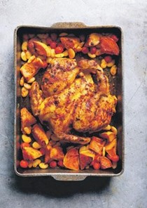 Slow-roasted paprika chicken with butternut squash, smashed butter beans and tomatoes