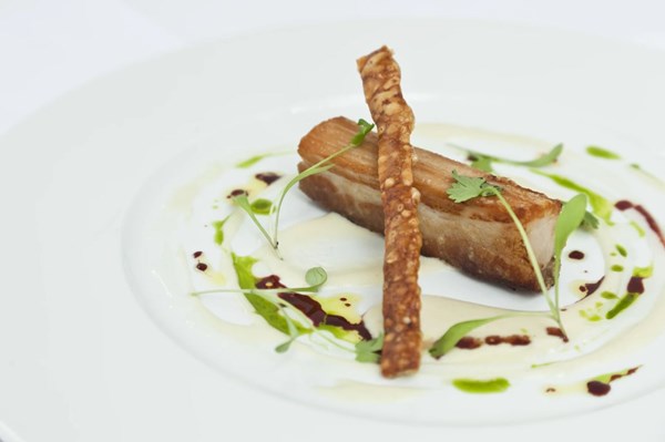 Slow-roasted pork belly with apple sauce, garlic purée & Port jus [Galton Blackiston]