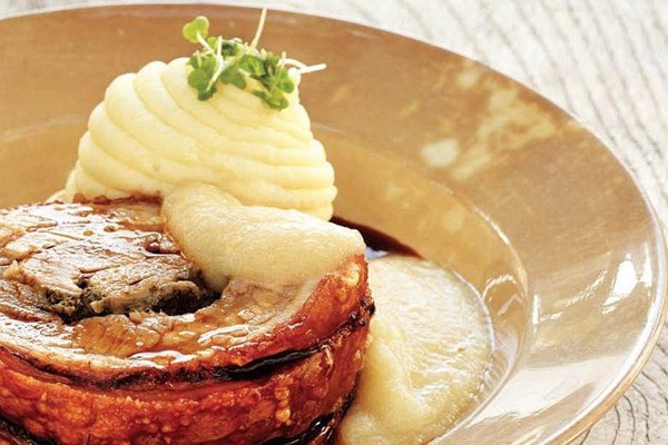 Slow-roasted pork belly with mashed potato and Bramley apple sauce